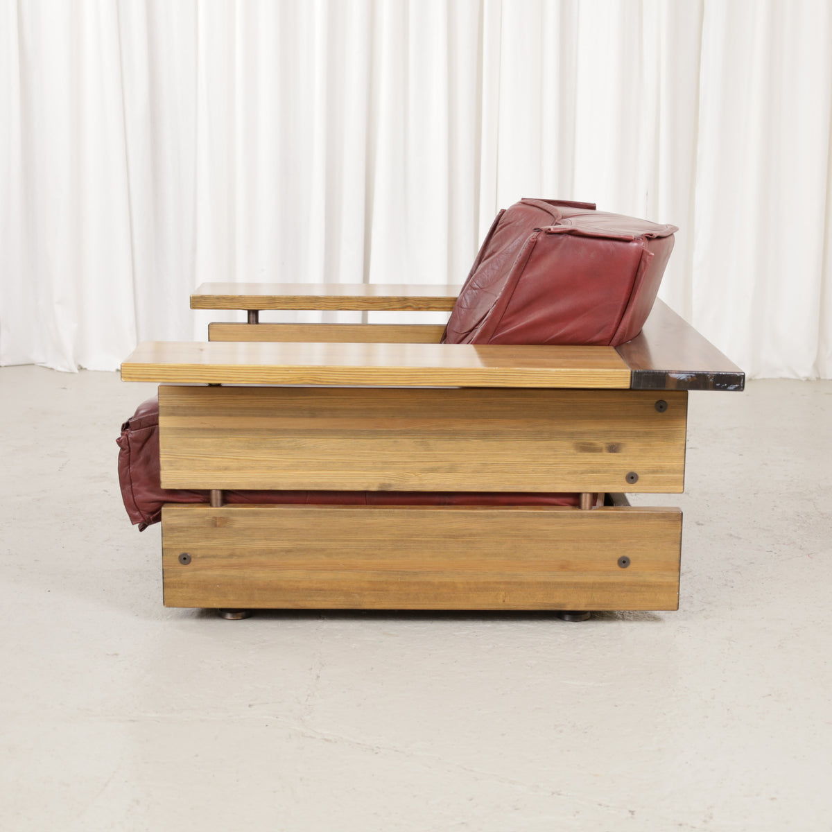 Mattias Ingman Pinus armchair in reddish-brown leather and pine, original photograph 2741