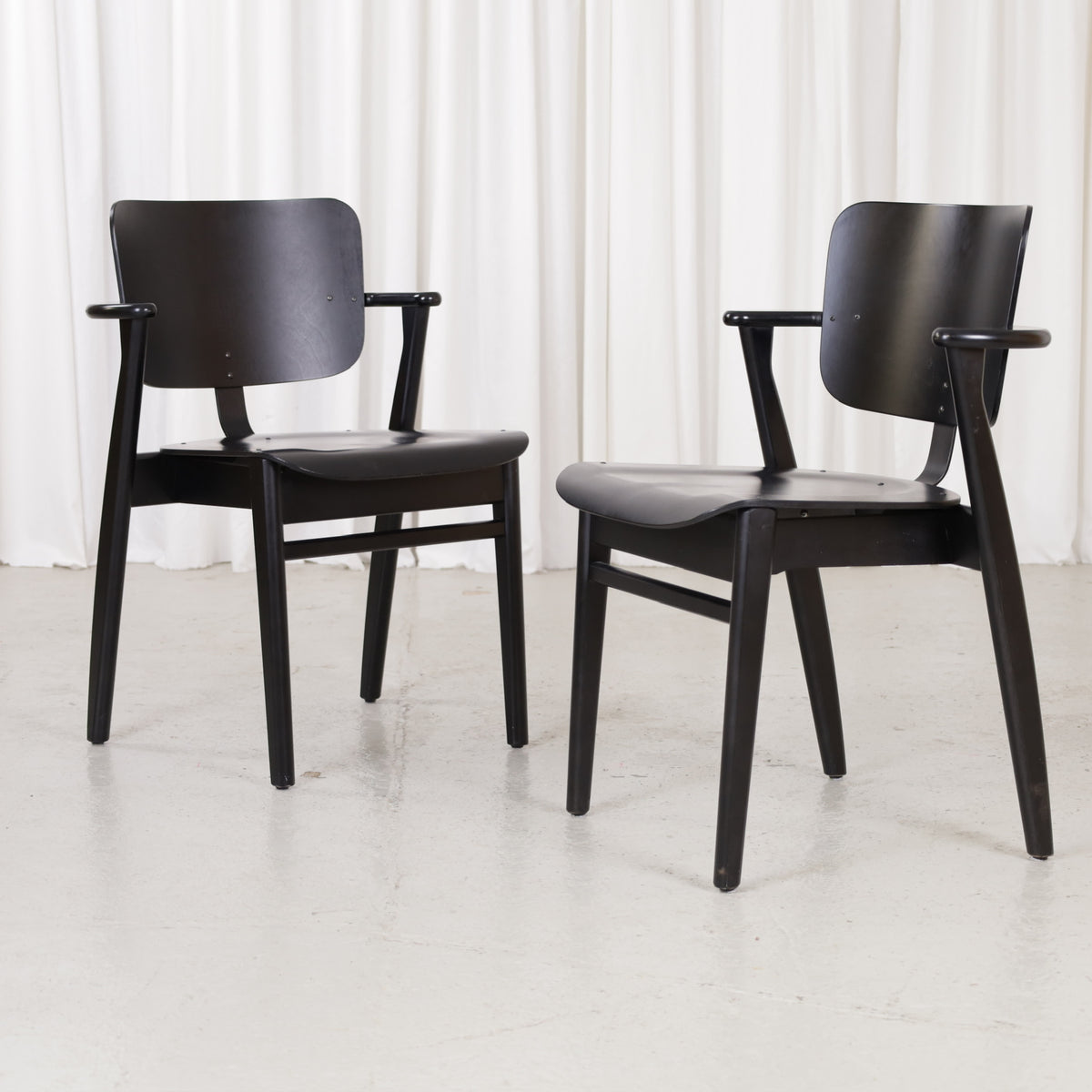 Two black Artek Domus chairs by Ilmari Tapiovaara, sold individually
