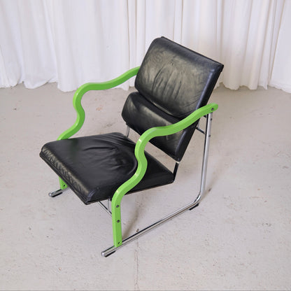 Yrjö Kukkapuro Experiment Lounge Chair in Black Leather and Green Armrests