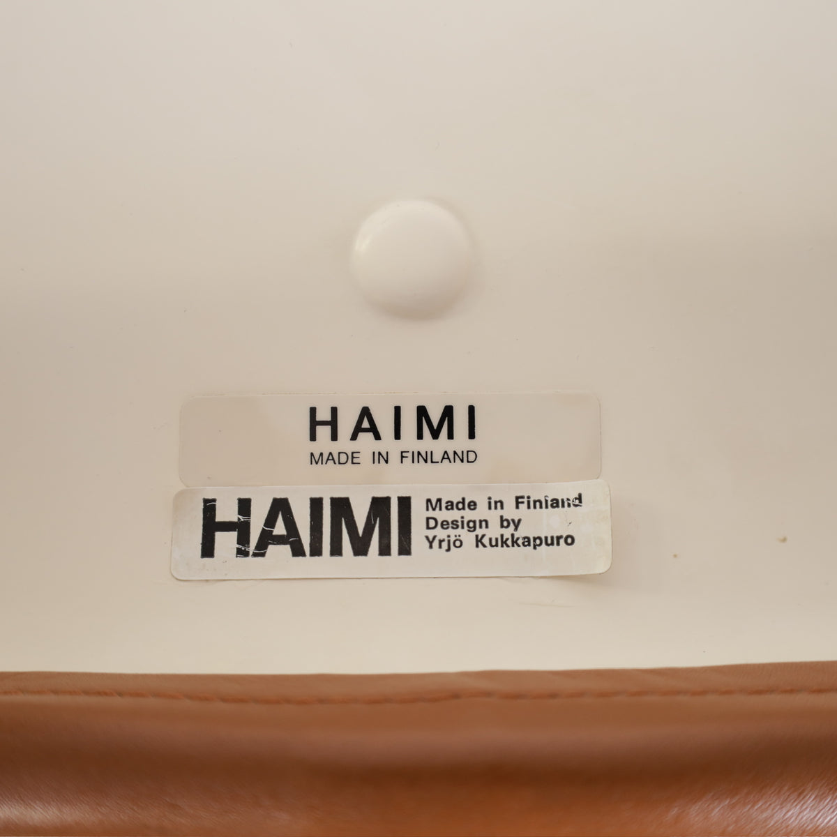 Yrjö Kukkapuro Junior chair in cognac leather – Haimi manufacturer labels