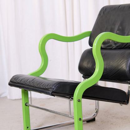 Yrjö Kukkapuro Experiment Lounge Chair in Black Leather and Green Armrests