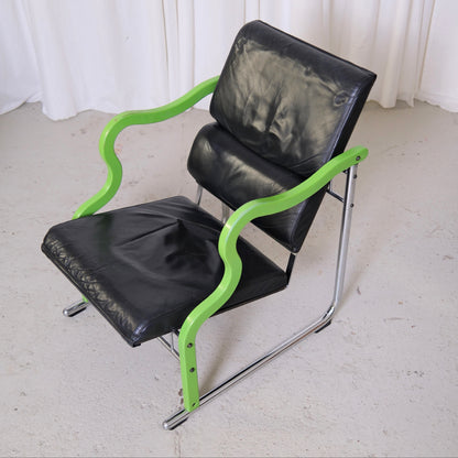 Yrjö Kukkapuro Experiment Lounge Chair in Black Leather and Green Armrests