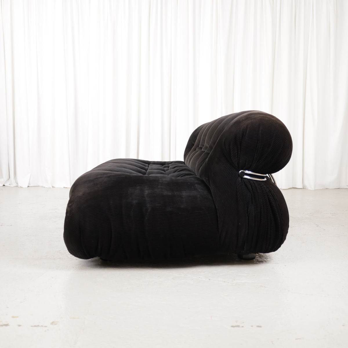 Cassina Soriana sofa in black corduroy – side view