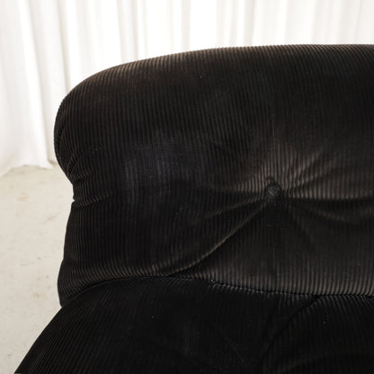 Cassina Soriana sofa in black corduroy – buttoned backrest detail
