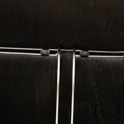 Cassina Soriana sofa in black corduroy – chrome frame close-up