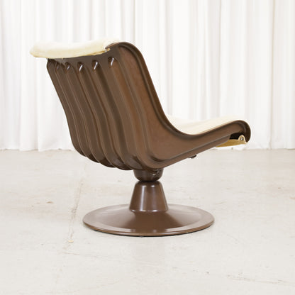 Yrjö Kukkapuro 3814-1KF chair, brown shell and pale yellow upholstery – opposite rear angle