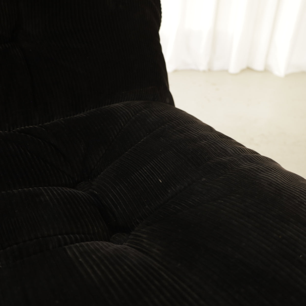 Cassina Soriana sofa in black corduroy – seat upholstery texture