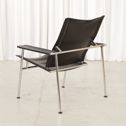 Yrjö Kukkapuro Casino lounge chair in black leather – three-quarter rear view