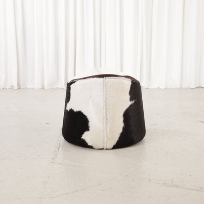 Niels Gammelgaard IKEA Stockholm cowhide swivel ottoman – Opposite end view