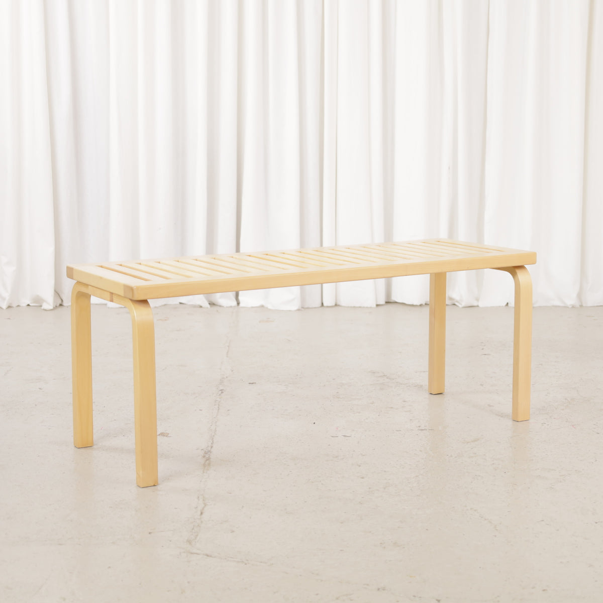 Alvar Aalto Artek 153A birch bench – Rear angled view