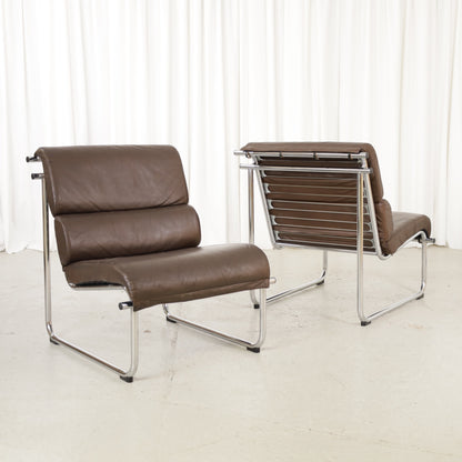 Yrjo Kukkapuro armless medium Remmi lounge chair in brown leather, two chairs shown, sold individually
