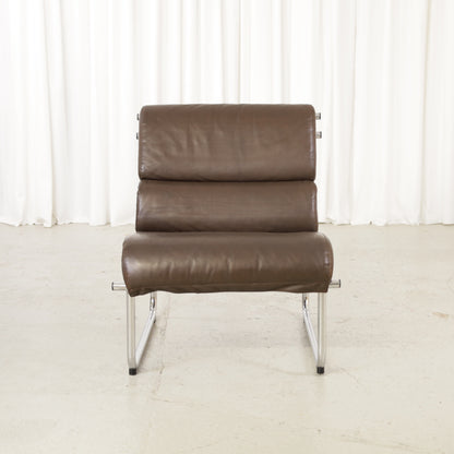 Yrjo Kukkapuro armless medium Remmi lounge chair in brown leather, chromed frame