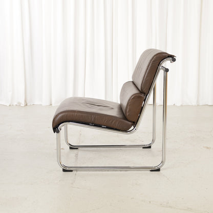 Yrjo Kukkapuro armless medium Remmi lounge chair in brown leather, chromed frame