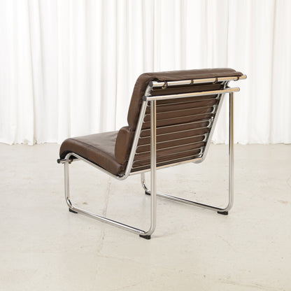 Yrjo Kukkapuro Remmi medium lounge chair, brown leather and polished chromed frame