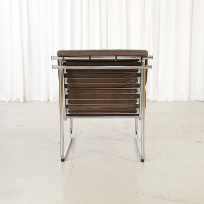 Yrjo Kukkapuro Remmi medium lounge chair, brown leather and polished chromed frame