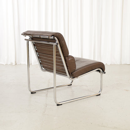 Yrjo Kukkapuro Remmi medium lounge chair, brown leather and polished chromed frame