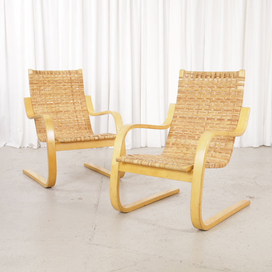 Alvar Aalto 406 rattan lounge chair, two chairs shown, sold individually
