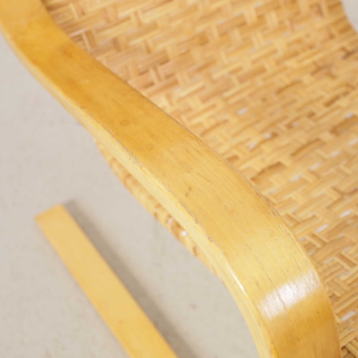 Alvar Aalto 406 lounge chair, rattan weave and birch frame