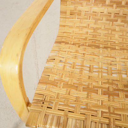 Alvar Aalto 406 lounge chair, worn and repaired rattan weave detail