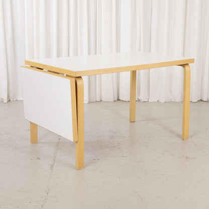 Alvar Aalto large drop-leaf table for Artek, white laminate top and birch frame