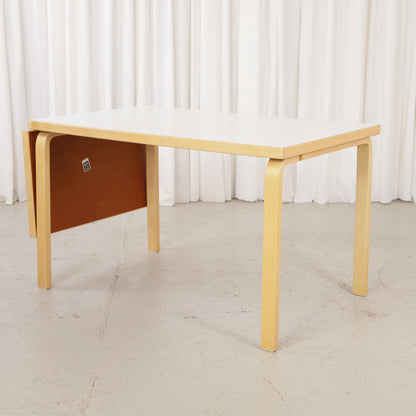 Alvar Aalto large drop-leaf table for Artek, white laminate top and birch frame