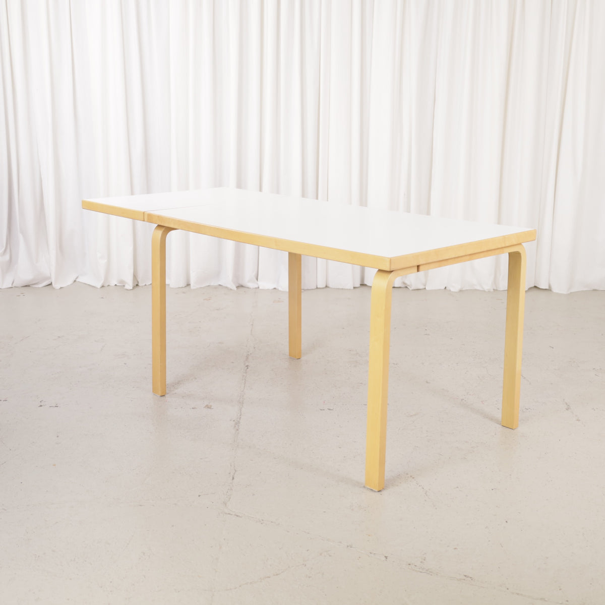 Artek large drop-leaf table by Alvar Aalto, extension leaf raised