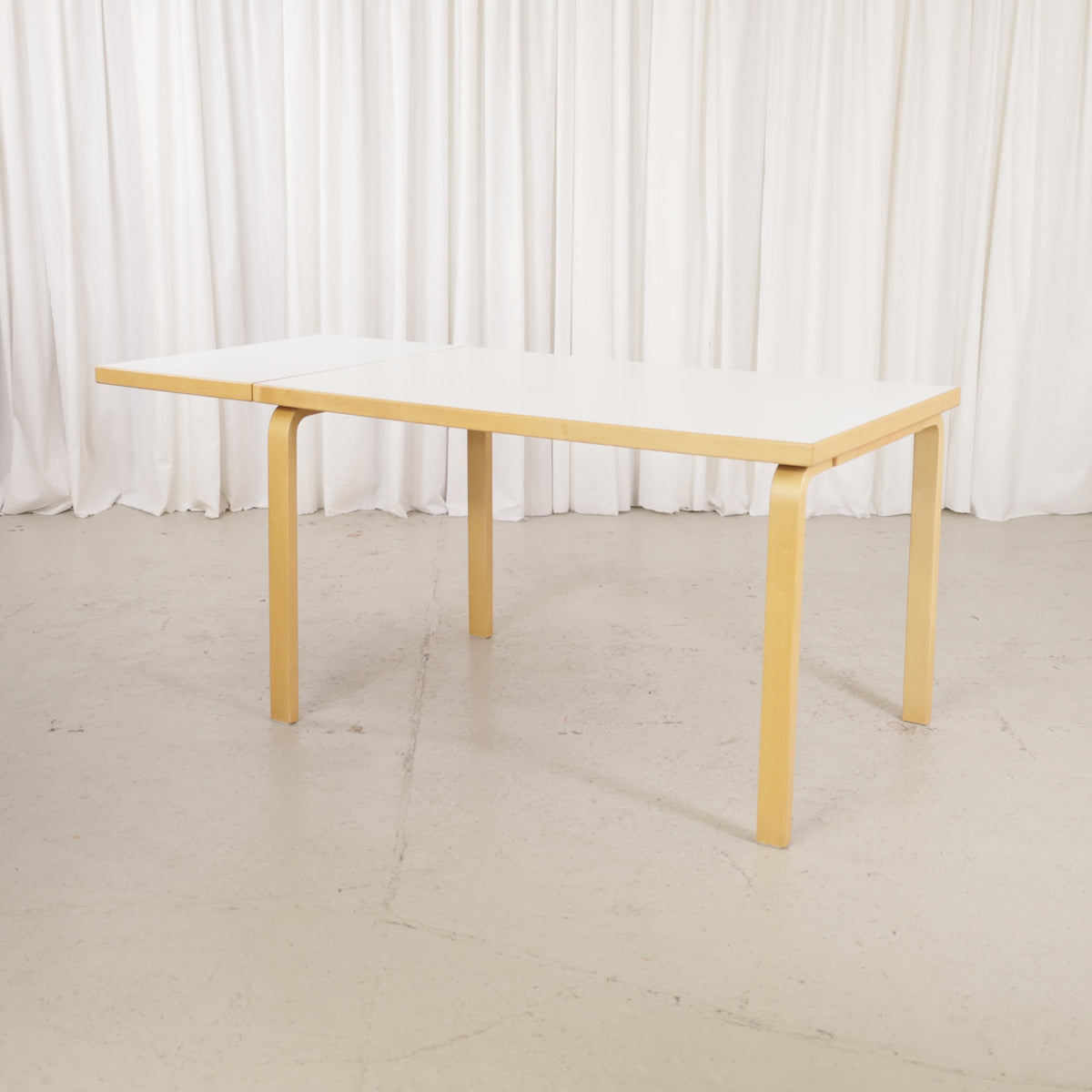 Artek large drop-leaf table by Alvar Aalto, extension leaf raised