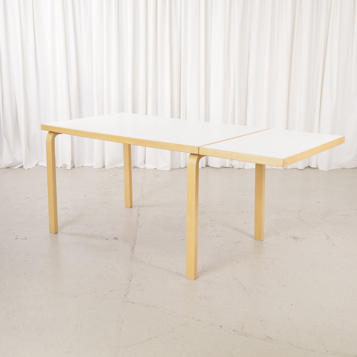 Artek large drop-leaf table by Alvar Aalto, extension leaf raised