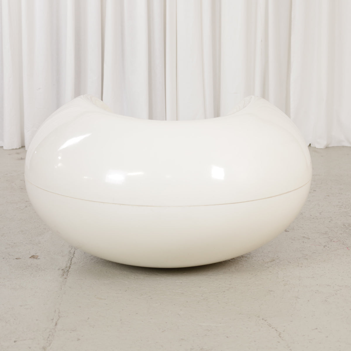 White Pastilli chair, rear view of rounded fibreglass shell