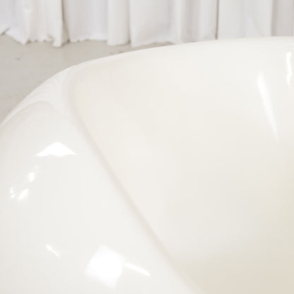 Detail of glossy white fibreglass seating surface