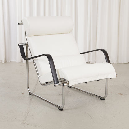 Remmi lounge chair in white leather, opposite front view