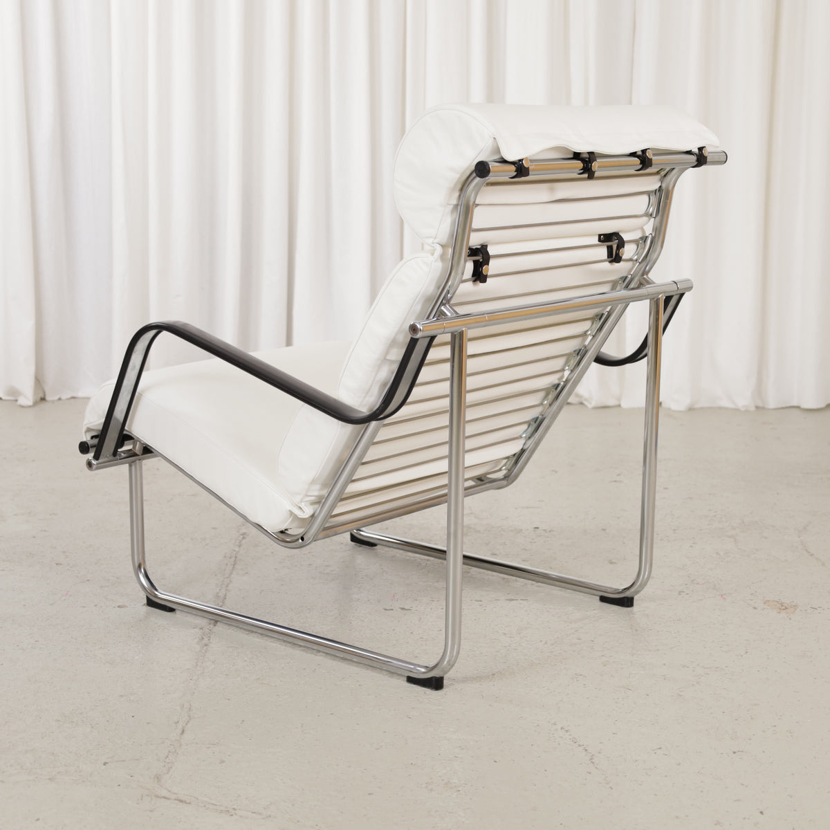 Remmi lounge chair, opposite rear three-quarter view