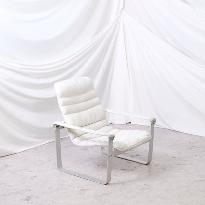 Rare Ilmari Lappalainen Pulkka prototype chair for Asko in white leather with metal frame. Vintage Finnish design with original Asko label.
