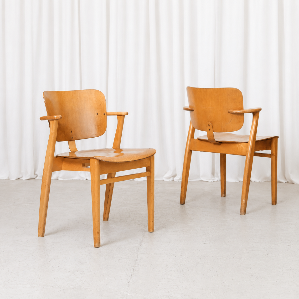 Vintage 1950s Domus chair by Ilmari Tapiovaara with beautiful original patina. A fully usable Finnish design classic with visible signs of age.