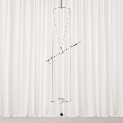 Original Ingo Maurer Ilo Ilu kinetic light sculpture from 1986. A distinctive postmodern design combining light, movement, mirror elements and geometric forms.