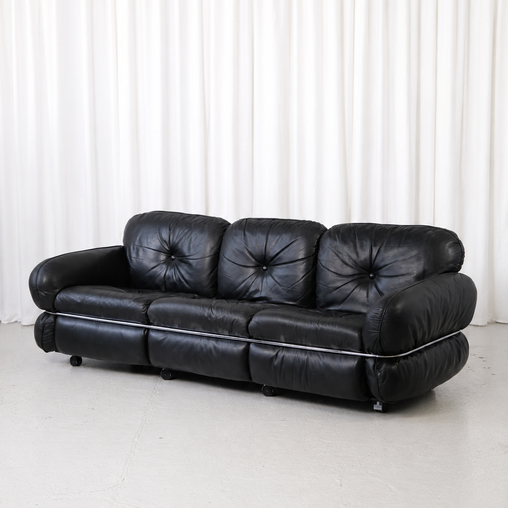 Isku Hannibal sofa by Kurt Hvitsjö in black leather with chrome frame
