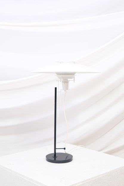 Original Juha Leiviskä table lamp from Finland. Soft layered light and minimal design. Atmospheric Scandinavian lighting. Worldwide shipping.