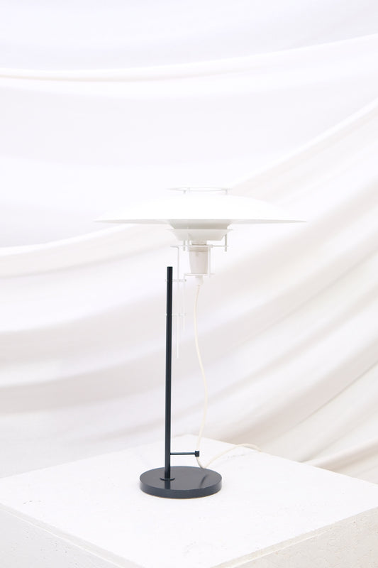 Original Juha Leiviskä table lamp from Finland. Soft layered light and minimal design. Atmospheric Scandinavian lighting. Worldwide shipping.