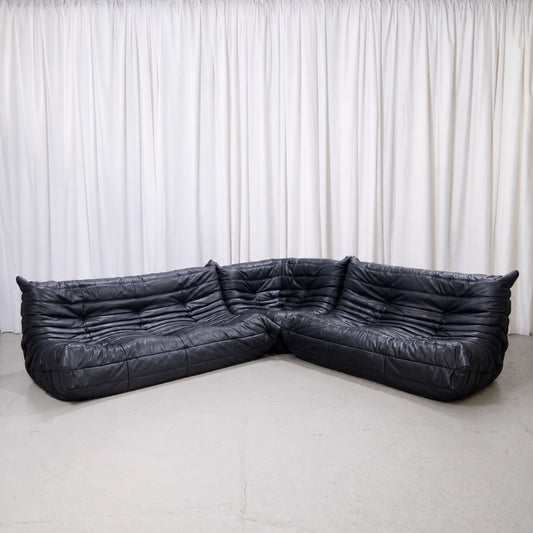 Ligne Roset Togo modular sofa set in black leather with three-seater, two-seater and corner piece
