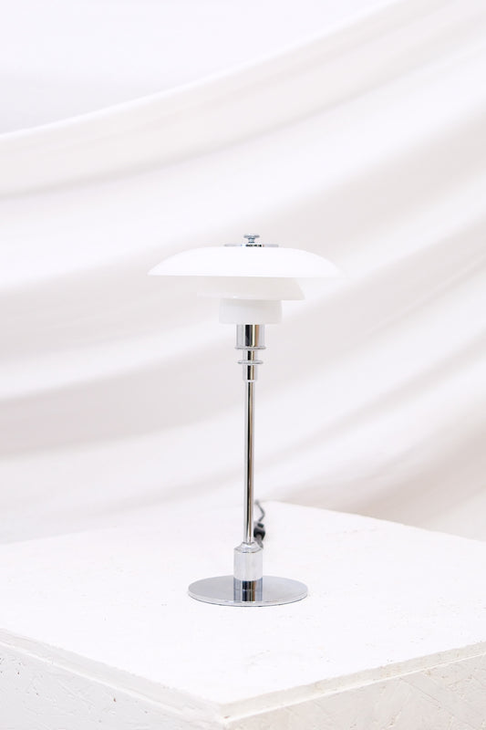 Original Louis Poulsen PH 2/1 table lamp with Poul Henningsen three-shade design in opal glass and chrome base. Classic Scandinavian lighting. Worldwide shipping.