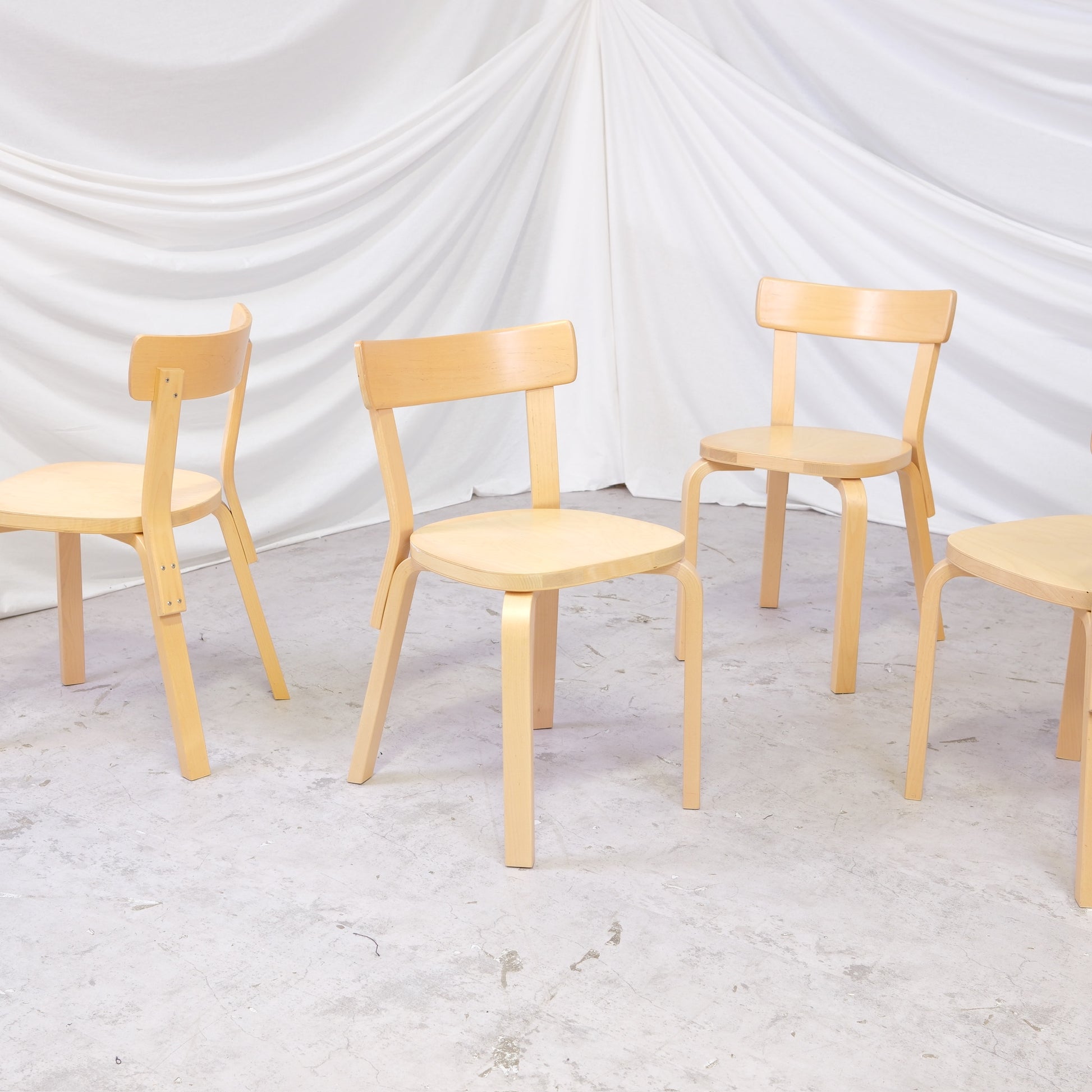 Set of vintage Artek 69 birch dining chairs by Alvar Aalto