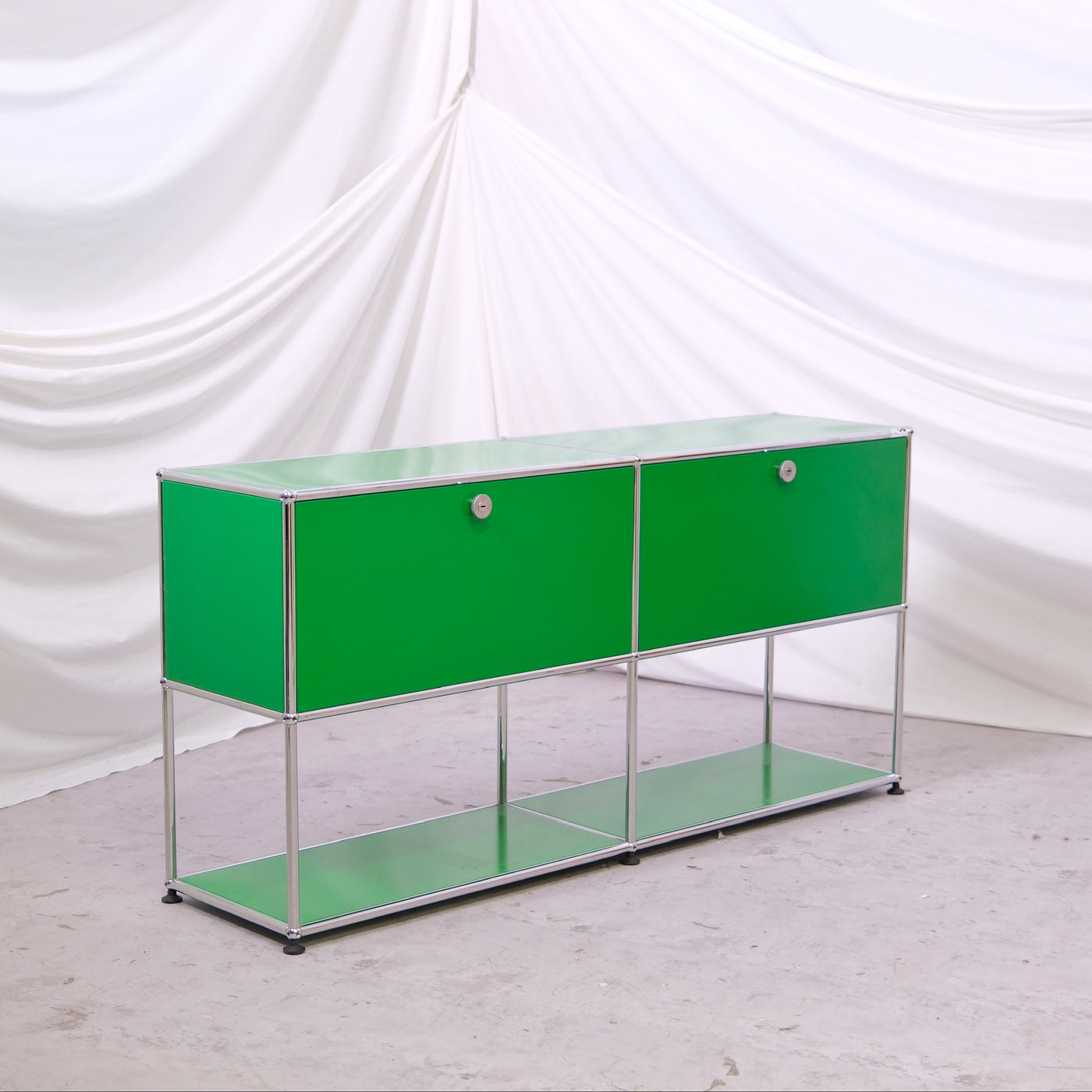 USM Haller green sideboard, 153 cm length. Modular chrome frame storage cabinet. Worldwide shipping available.