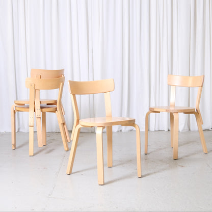 Vintage Alvar Aalto Artek 69 chairs in birch with rounded seats and simple backrests