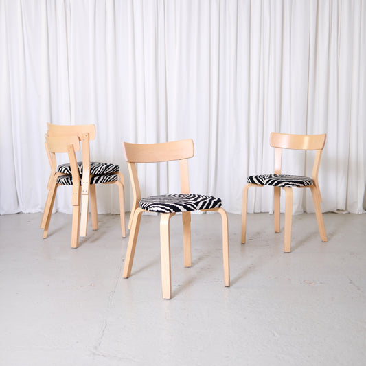 Vintage Alvar Aalto Artek Chair 69 in birch with zebra-pattern upholstery, Finnish design dining chair photographed at Pino Interiors Helsinki.