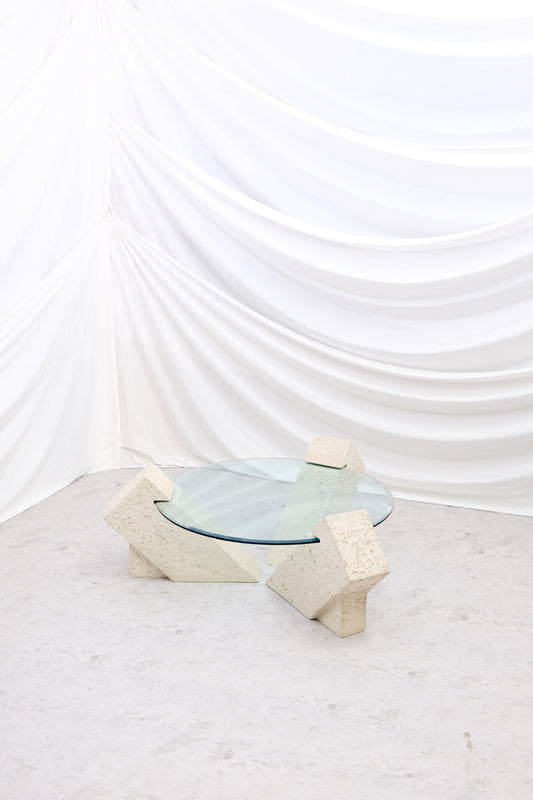 Vintage Brutalist style coffee table with solid stone base and large round glass top. Strong sculptural design. Worldwide shipping available from Helsinki.