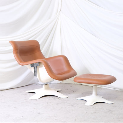 Vintage Yrjö Kukkapuro Karuselli chair with ottoman, manufactured by Haimi. White fiberglass frame with newly reupholstered brown leather. Worldwide shipping available.