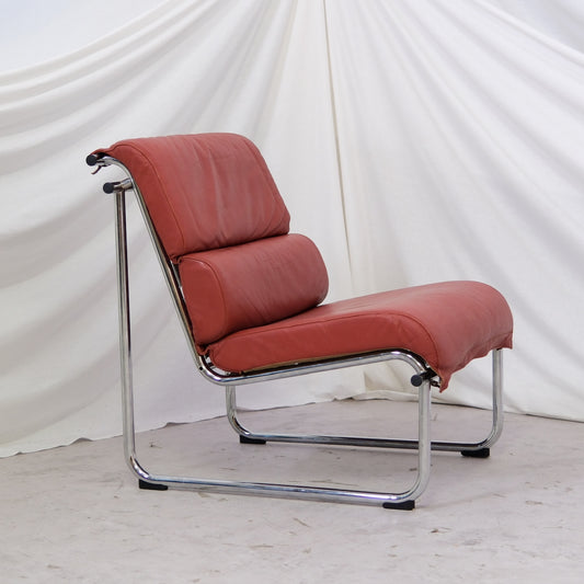 Remmi lounge chair Finnish design chrome tubular frame leather upholstery