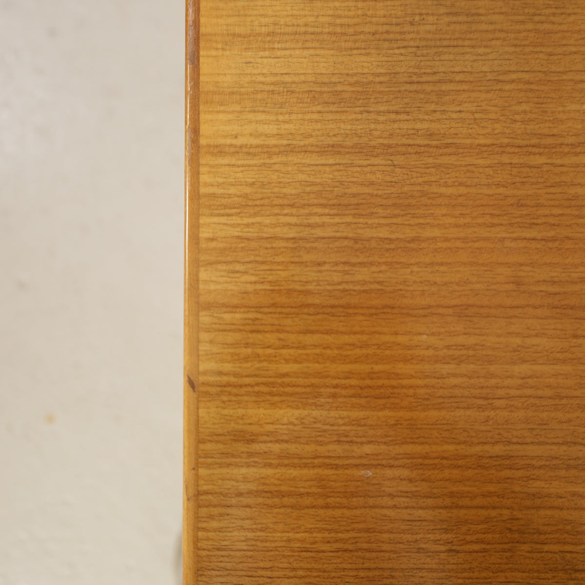 Alvar Aalto extendable teak table with figured birch legs — tabletop, extension leaf or frame detail