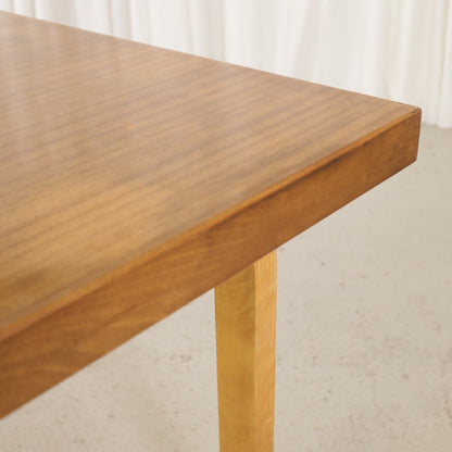 Alvar Aalto extendable teak table with figured birch legs — tabletop, extension leaf or frame detail
