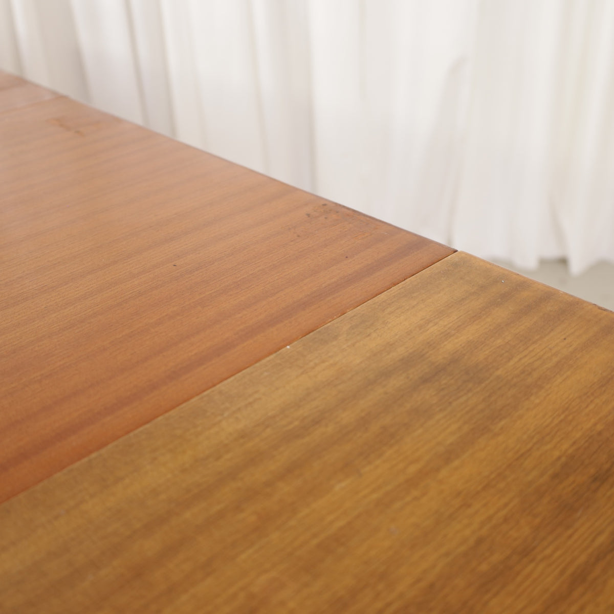 Alvar Aalto extendable teak table with figured birch legs — tabletop, extension leaf or frame detail